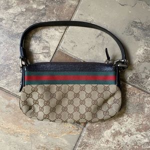 Authentic vintage Gucci clutch with boot charm